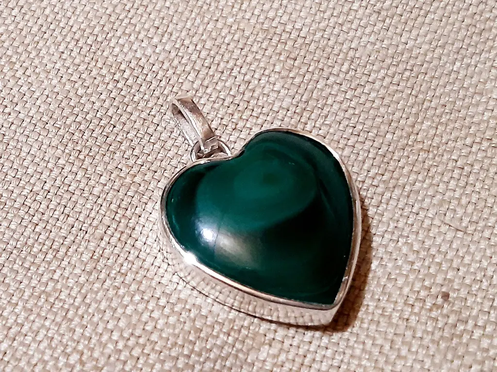 Home sterling silver pendant with deep green gemstone – front angle 2