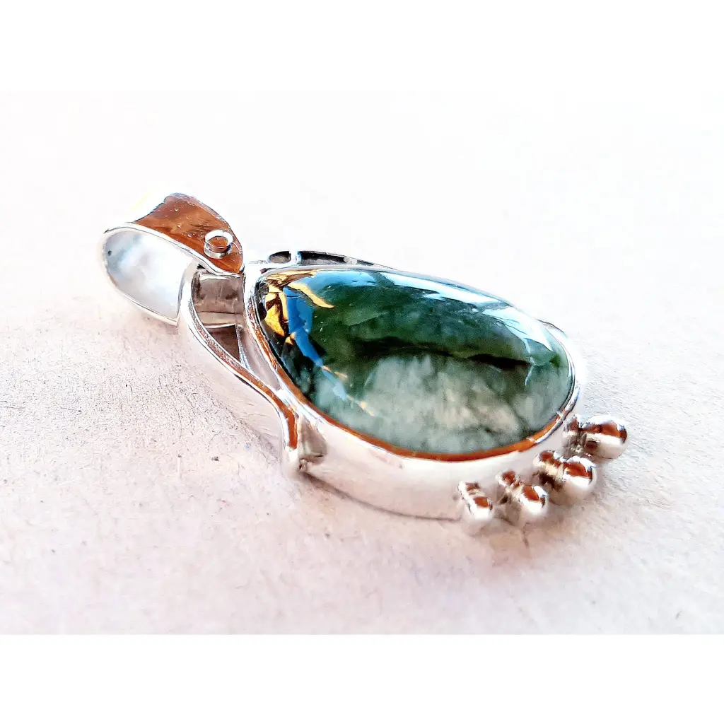 First Flight sterling silver pendant with moss agate – front angle