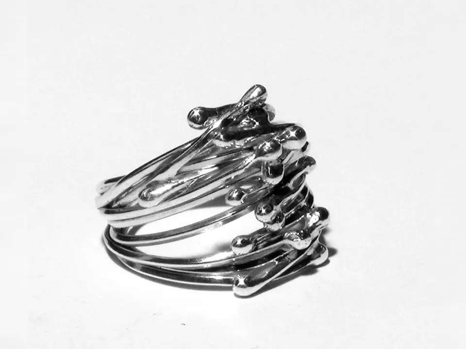 Handcrafted silver contemporary ring sculpture titled Entanglement by MoodObjekt