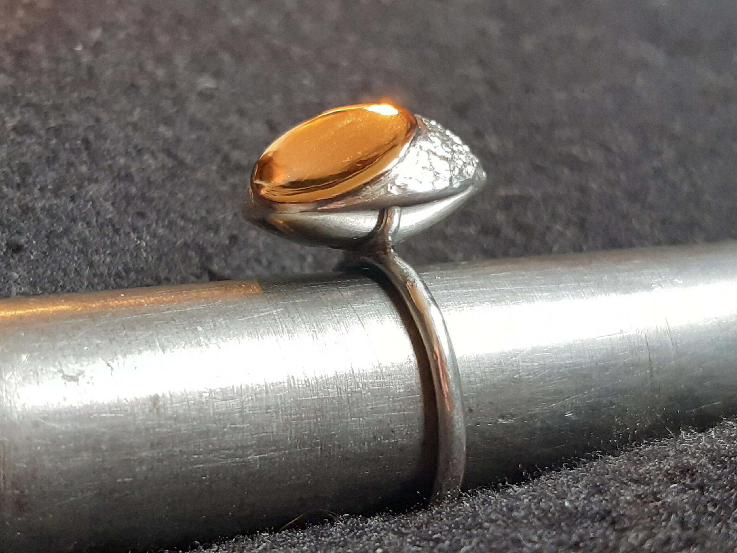 Side view of The Sun and The Moon handcrafted sterling silver and gold contemporary ring by MoodObjekt