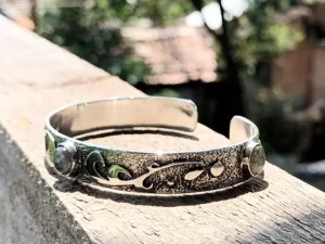 Sculptural angle view of the Gathered one-of-a-kind sterling silver bracelet.