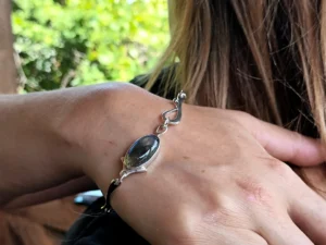 Blue Hour contemporary sterling silver bracelet worn on the hand.