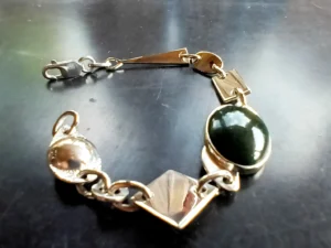 Sculptural angle view of the Silhouette contemporary sterling silver bracelet