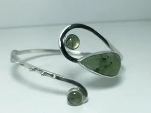 Angled view of the Moonbound contemporary sterling silver bracelet.