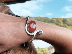 Last Light contemporary sterling silver bracelet worn on the hand.