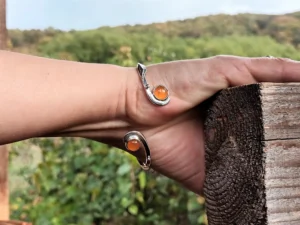 Alternative view of the Last Light contemporary sterling silver bracelet worn on the hand.