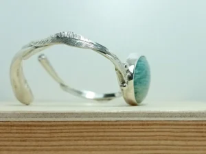 Profile view of the Between contemporary sterling silver bracelet.