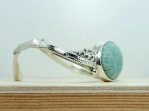 Profile view of the Between contemporary sterling silver bracelet.