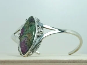 Angled view of the Still Growing contemporary sterling silver bracelet.