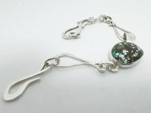 Angled view of the Elsewhere contemporary sterling silver bracelet.