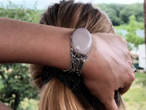 Daybreak contemporary sterling silver bracelet worn on the hand.