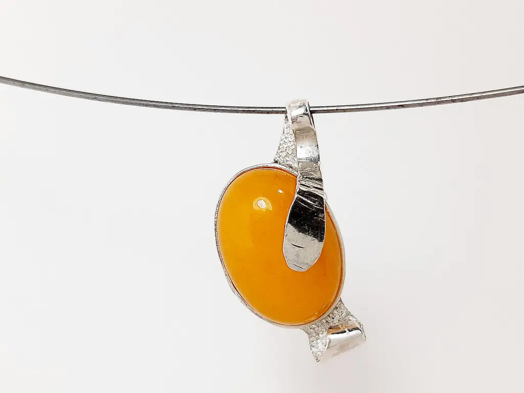 Fried Egg sterling silver pendant with yellow gemstone – front