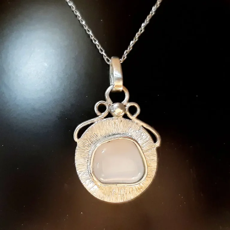 Moonlit sterling silver pendant with luminous natural gemstone – front