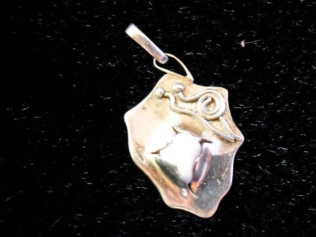 Carried Away sterling silver pendant – front