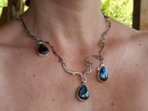 Cadence sterling silver necklace worn around the neck