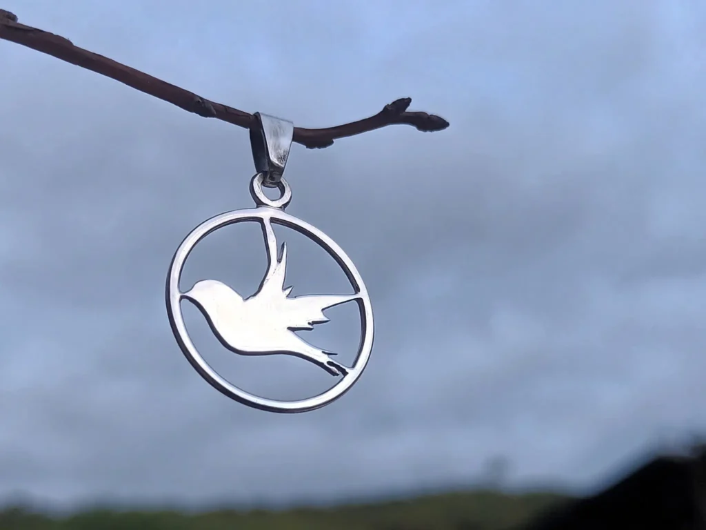 Skyward handcrafted sterling silver bird pendant